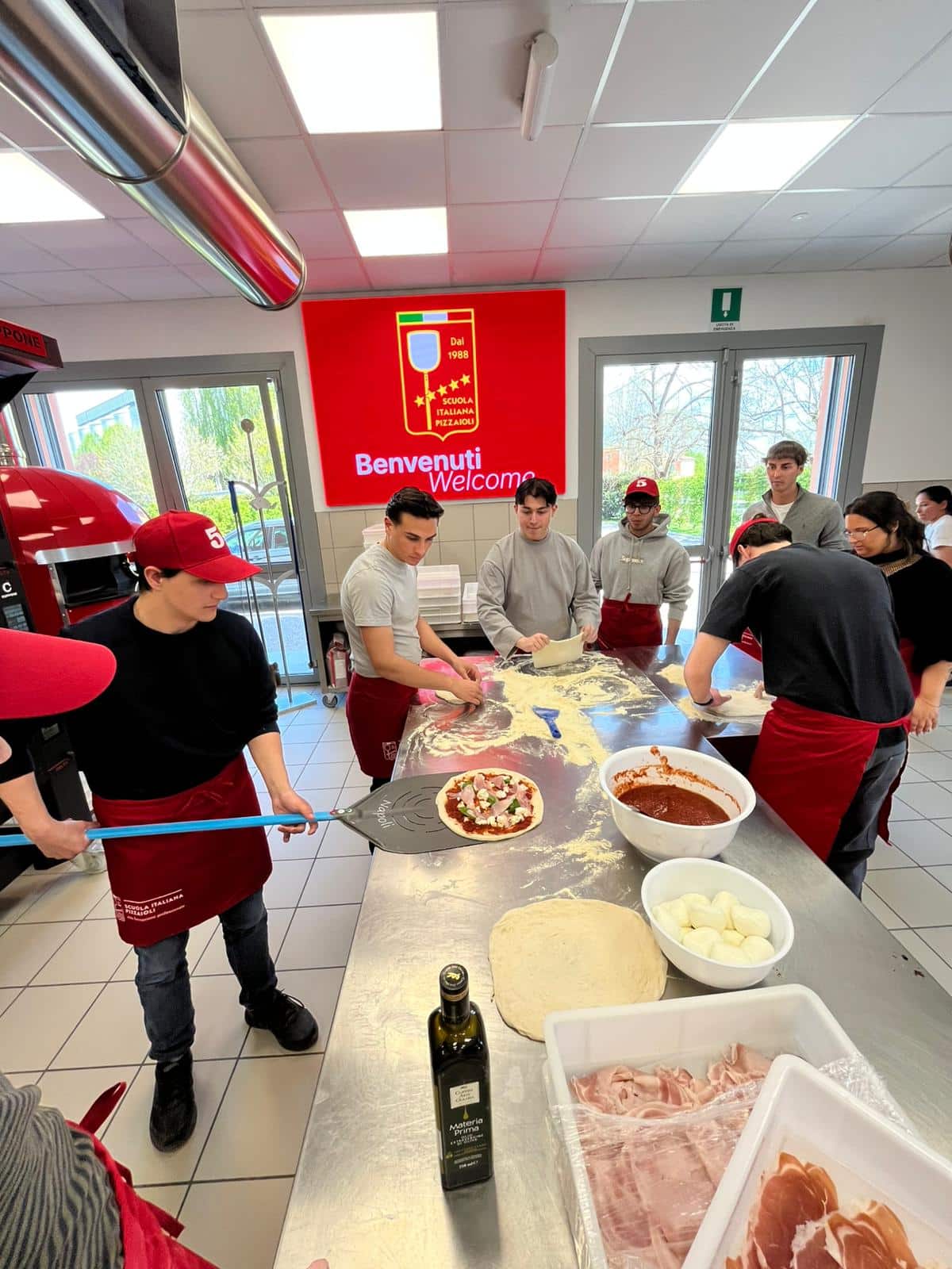 Pizzas, doughs and mystery boxes: Pollenzo students visiting Scuola Italiana Pizzaioli